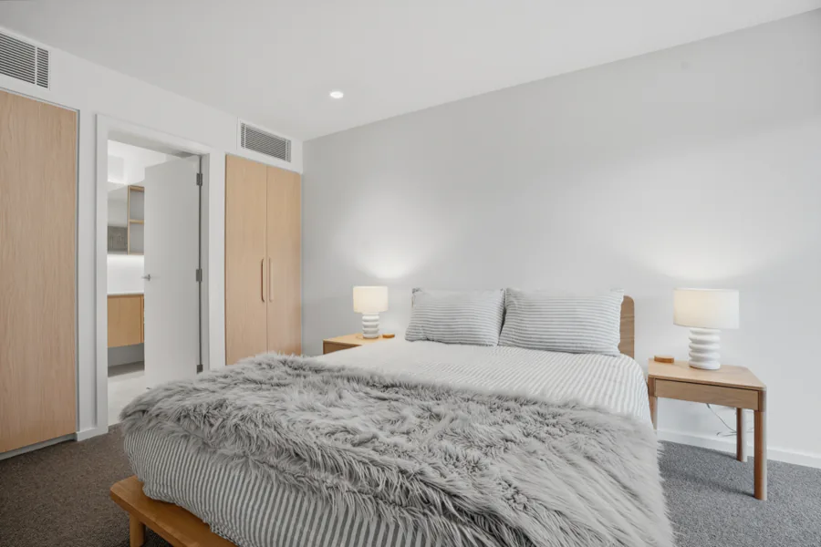 The main bedroom, with built-in robes and its own ensuite