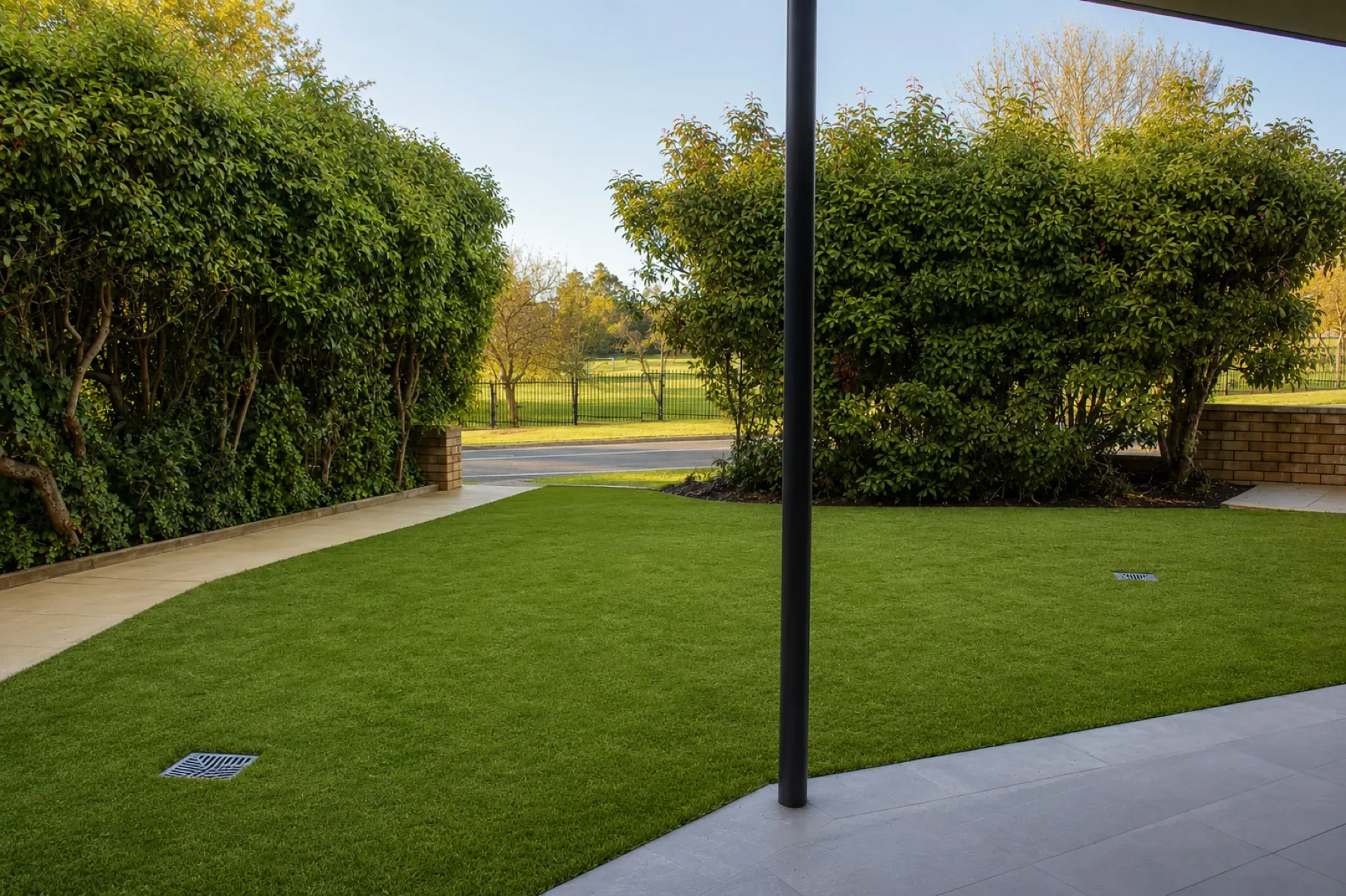 Lawn and garden looking out to parkland across the street