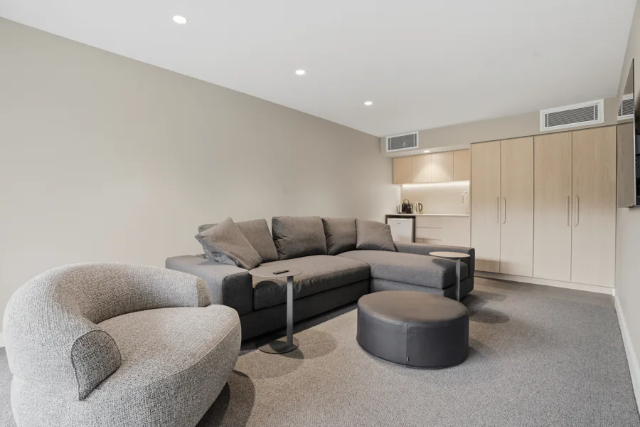 The downstairs studio, with a corner lounge and kitchenette