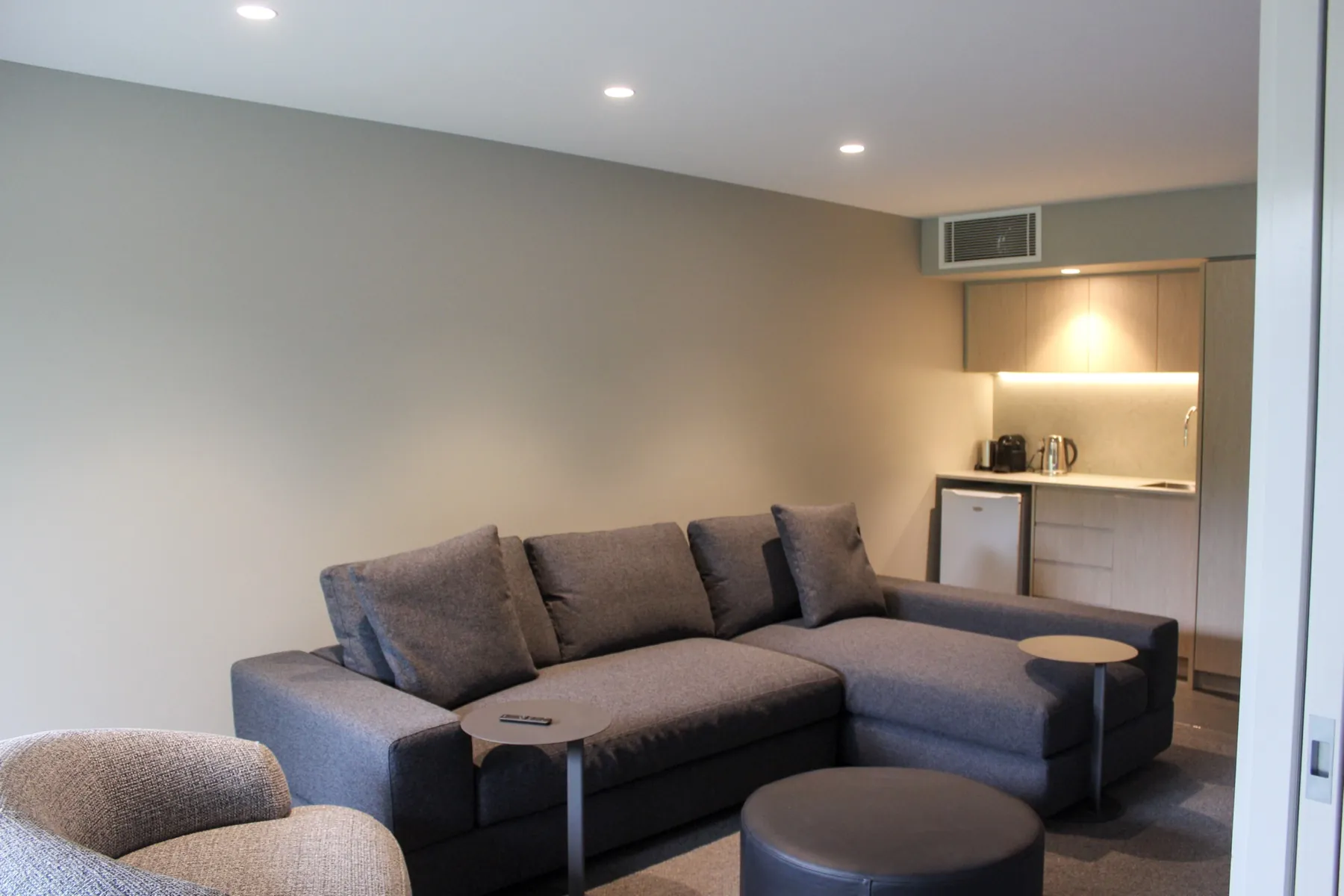 Downstairs studio lounge with kitchenette